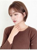 オレンジブラウンの髪質改善ひし形ショート