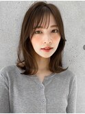薄めバングエアリーカールアプリコットオレンジ小顔カット