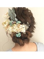 ノル(nol.)&nbsp;[toshi'sアレンジ]華やかルーズシニヨンアレンジ