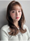 くせ毛風カールくびれヘア斜めバング美髪ホワイトブロンド