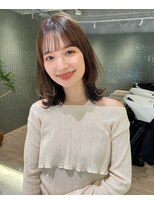 外ハネして表面ワンカールで決まるレイヤーカット