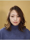アプリコットオレンジで彩る夏のゆる巻きミディ