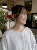 飾りが映えるタイトシニヨン