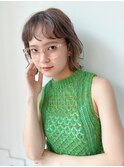ベージュカラーとニュアンスパーマの爽やかボブ