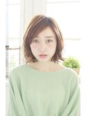 ルーズなハネ感のパーマスタイル
