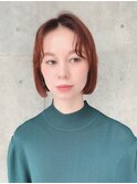 切りっぱなしボブにテラコッタオレンジ