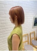 くびれヘアくびれボブ外ハネミディアムヘアオレンジカラー