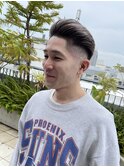 スリックバック　担当西村