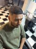 This is the price for a barber-style fade cut for overseas guests.”