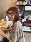 オレンジカラーゆるふわウェーブボブスタイルオン眉バング
