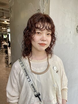 リム(LIM) くるくるウルフパーマとオレンジカラー