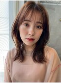 ショートボブくびれヘアアプリコットオレンジタッセルボブ