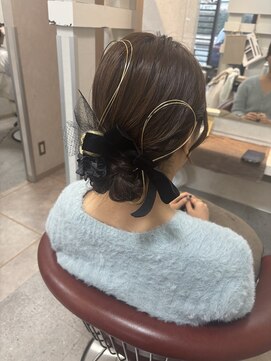 タイトなアップスタイル