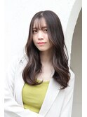 巻き髪スタイル。