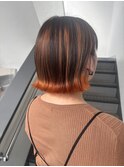 ボブスタイルのオレンジバレイヤージュカラー