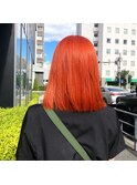 ディープオレンジの切りっぱなしボブ