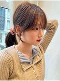 一つ結びハッシュカットフレンチバング顔周りカットブラウン