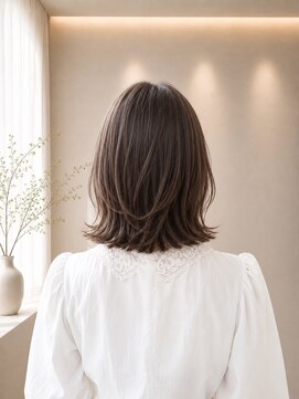 キラク(kirak) 毛先で楽しむミディアムパーマスタイル