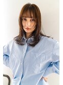 レイヤーとニュアンスパーマが奏でるコケティッシュな雰囲気
