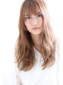 小顔バング[mignon]ふわっとカール動きのある上品女性
