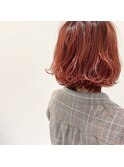 チェリーオレンジカラーのボブスタイル