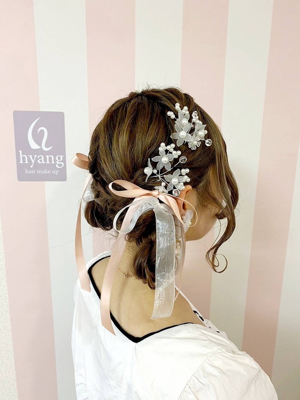 ツインシニヨン編み込みアレンジ：L224596071｜ヒャン(hyang)の