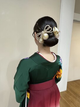 ミリオン美容室 シンプル艶シニヨン