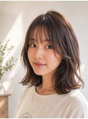 女性らしいミディアムカールスタイル
