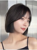 韓国風顔周りのある切りっぱなしタッセルボブ