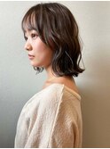 ナチュラルウェーブのミディアムスタイル