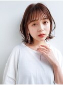 インナーカラーがかわいい抜け感ある束バングに外ハネくびれボブ