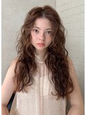 ロング強めスパイラルハードパーマーウェーブヘアブラウンカラー