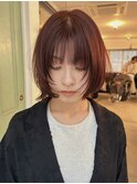 オレンジブラウンの顔まわりレイヤーボブ