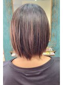 くせを伸ばすアイロンを使った縮毛矯正