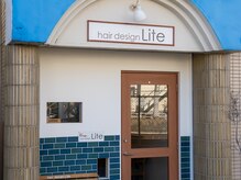 ライト(hair design Lite)の雰囲気（阪急の線路沿いにあります♪スカイブルーの壁が目印です）