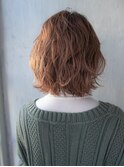 ヘーゼルベージュの外ハネボブ/センターパート/ニュアンスパーマ