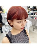 ピンクオレンジカラーのワイドバングボブ