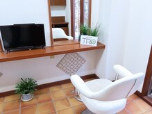 アートヘアートリップ(art hair TRIP)の雰囲気(石垣と白を基調とした外観が目印です。)