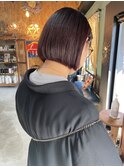 ピンクブラウンブリーチなしカラー切りっぱなしタッセル平行ボブ