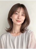 大人可愛いレイヤーウルフで小顔スタイル