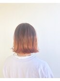 オレンジグラデーションの切りっぱなしボブ