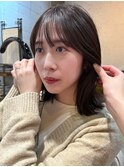 柔らかい黄味消しカラーくびれボブ