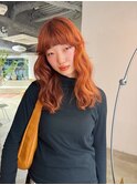 オレンジベージュフレンチバングミディアムレイヤーブリーチ
