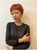 オレンジカラーが決めてのサマーショートヘア