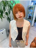 パツっとボブ×オレンジカラー