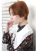 大人可愛いオレンジピンク×くびれハンサムショート