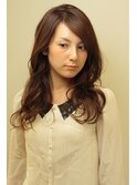 ツヤのあるウェーブでクラス感のある上品レディに