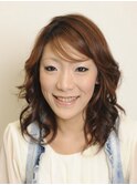 ふんわりと柔らかいカールスタイル