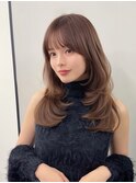 大人フェミニンなうち巻きスタイル