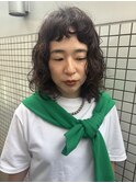 オン眉バングのくるくるパーマ